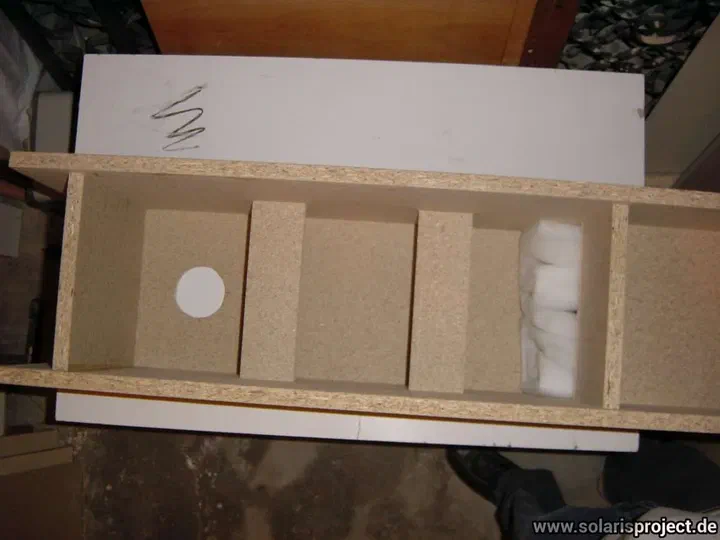 Speaker box with driver cutouts and foam lining