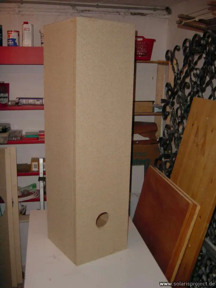 Wooden panel with speaker driver cutout holes