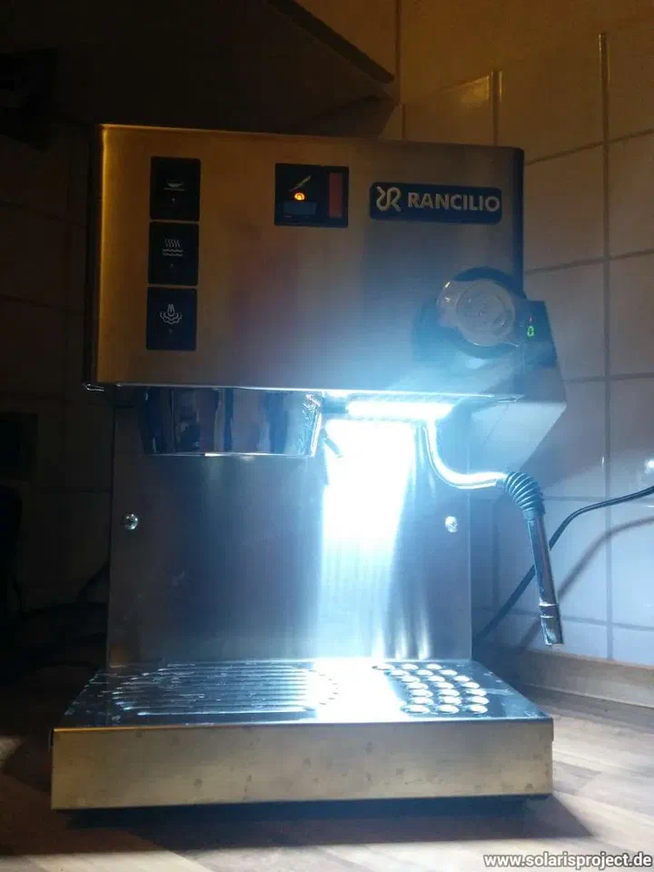 Front view with the LED light illuminating the brew area