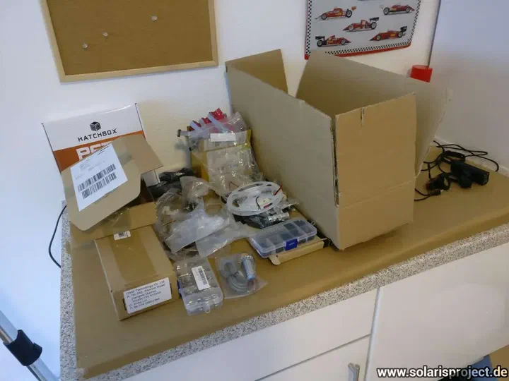 Initial VORON parts and hardware spread on table