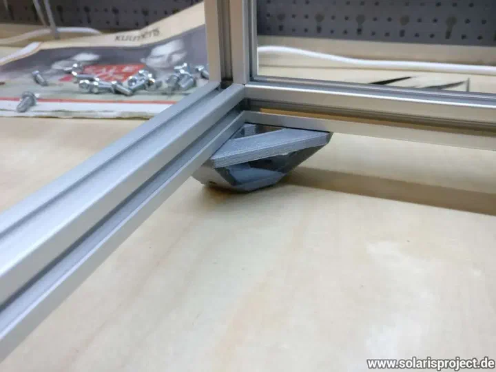 Frame extrusions with corner brackets attached