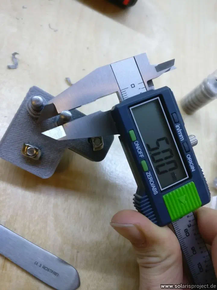 Idler assembly with bearings on steel dowel