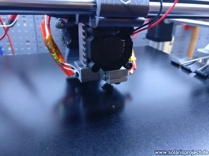 VORON printer first print in progress at night